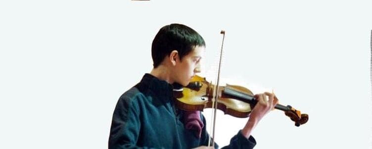 A student playing the violin